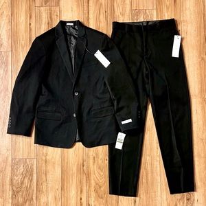Boys Calvin Klein Two Piece Suit with tags. Youth size 14. Black. Never worn.